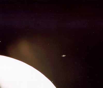 Saturn beside the bright limb of the Moon